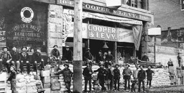 Goods piled up in front of Cooper and Levey store